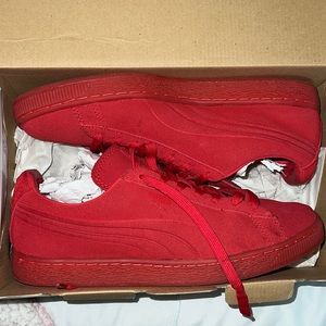 Red low top pumas